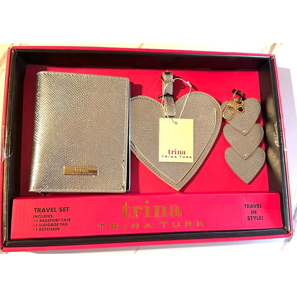 Trina Turk Handbags - Trina Turk Travel Set Silver 3 piece new . Passport cover luggage tag keychain